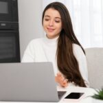 Happy confident mentor or coach giving online lecture